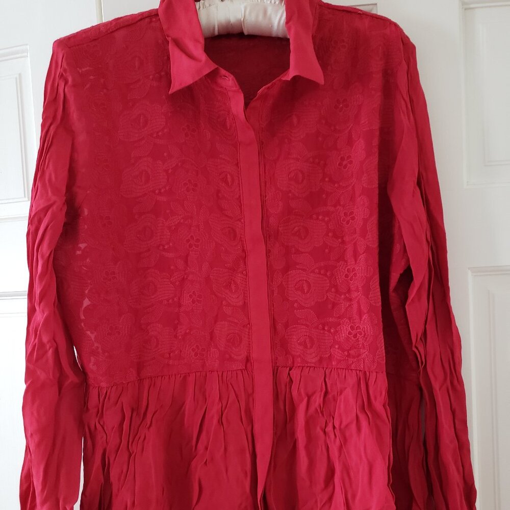 Versatile red button down shirt with ruffled peplum hem